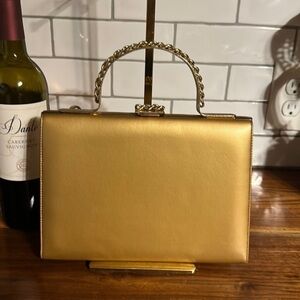 Vintage metallic gold Francois bag. Gold metal handle.